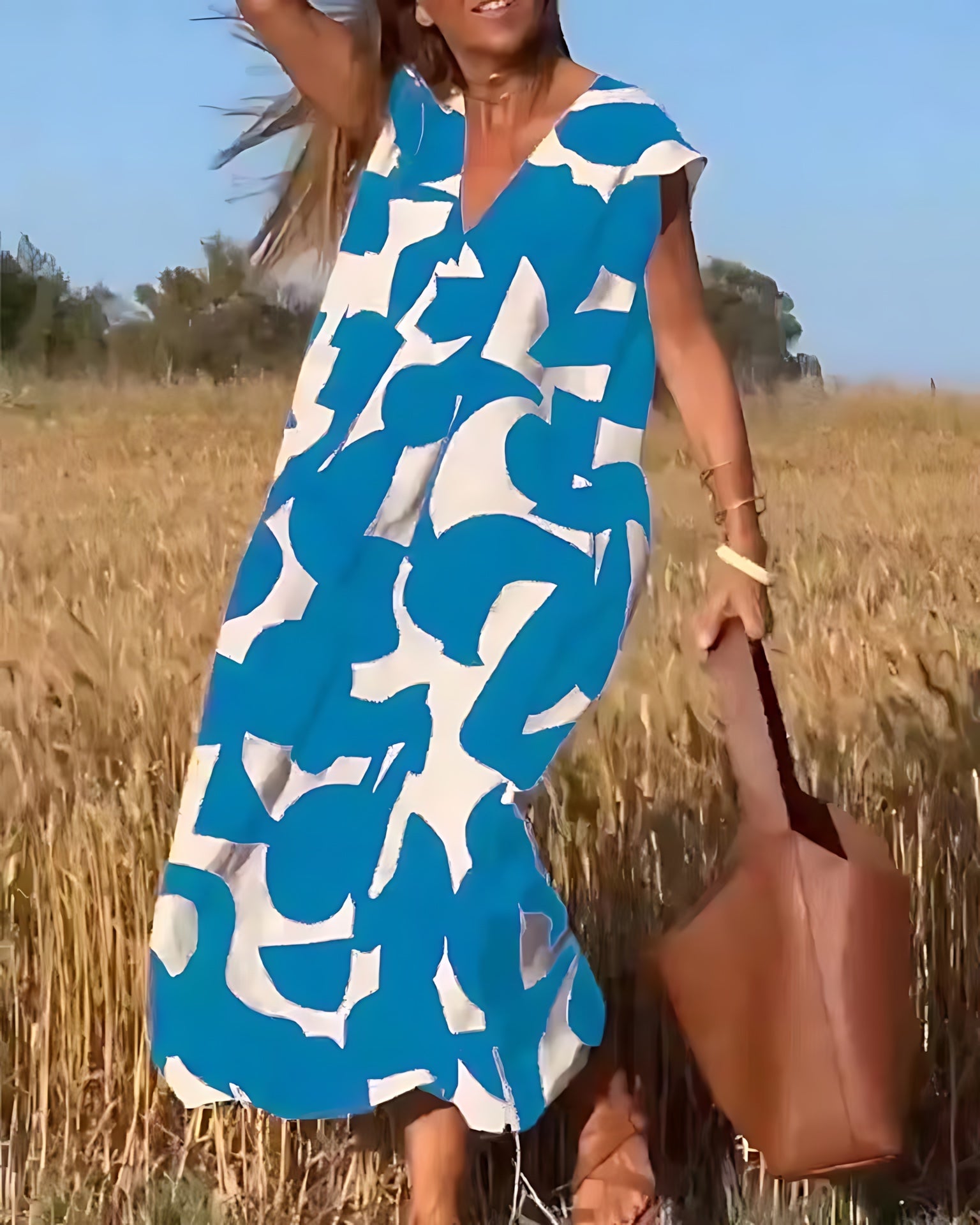 Amaya – Abstract Print V Neck Flowy Maxi Dress