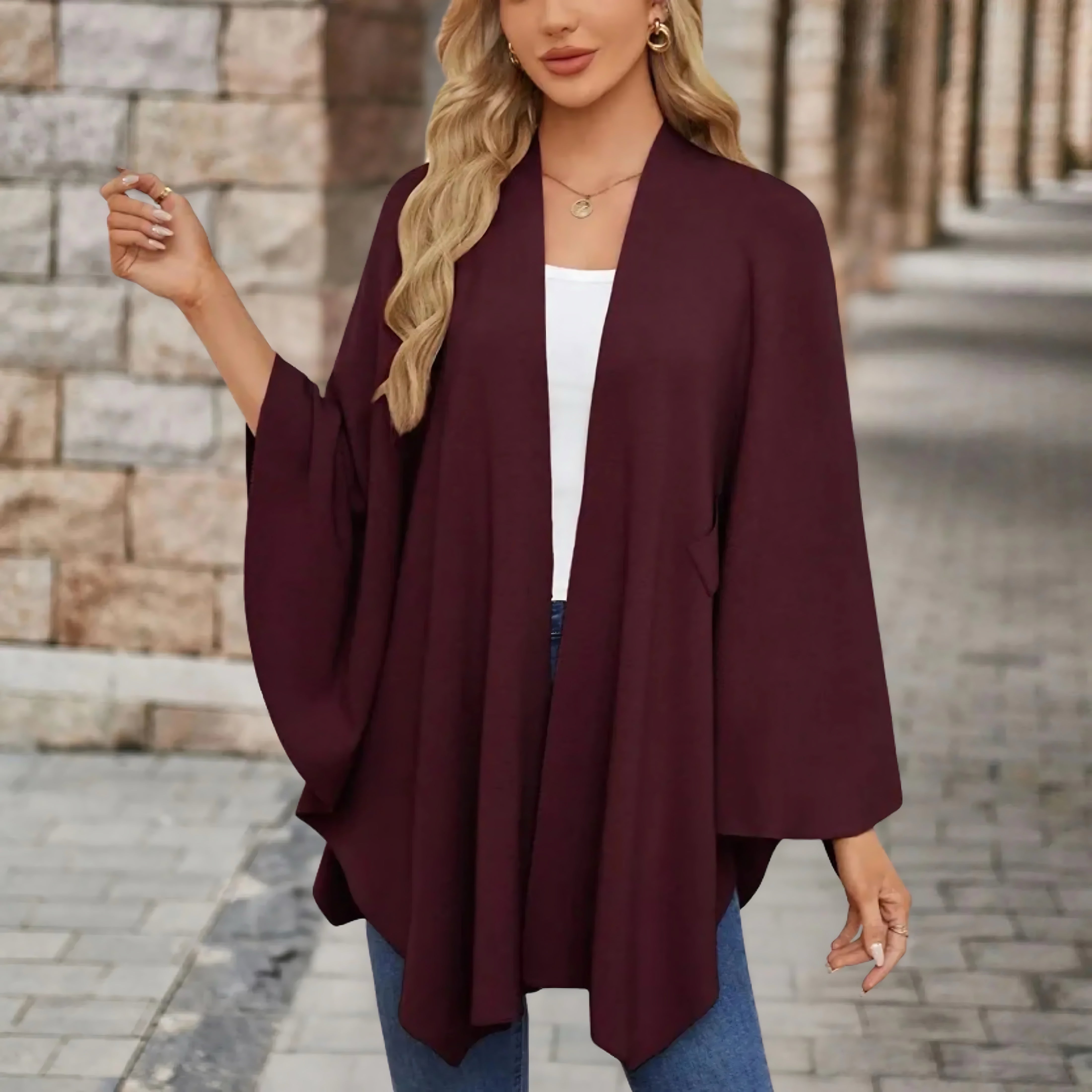 Ava – Draped Twist Front Knit Poncho