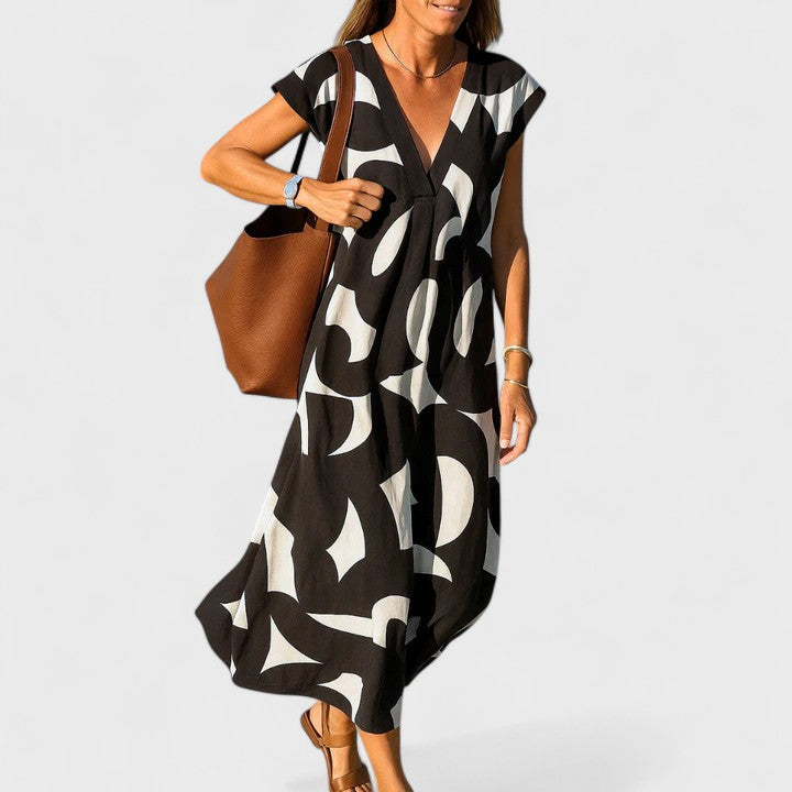 Juniper – Abstract Print V Neck Flowy Maxi Dress