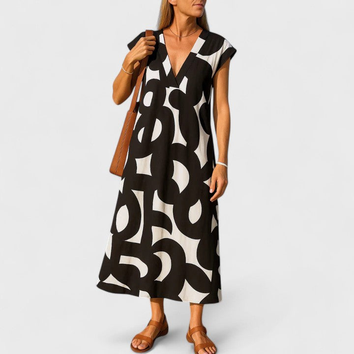 Juniper – Abstract Print V Neck Flowy Maxi Dress